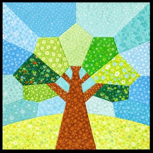 May include: A colorful patchwork tree design with a brown trunk and branches, green leaves, and a blue sky. The tree is set against a yellow and green floral patterned ground. The patchwork is made of various patterned fabrics.
