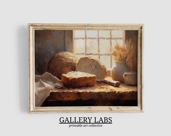 May include: A framed oil painting print depicting a rustic scene with a round loaf of bread, a sliced piece of bread, a white cloth, a ceramic vase with dried wheat stalks, and a small mug on a wooden table near a window with natural light.