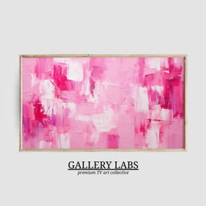 Könnte beinhalten: Ein rechteckiges Wandkunstwerk mit einem abstrakten Gemälde aus dicken, geschichteten Pinselstrichen in verschiedenen Rosa-, Magenta- und Weißtönen. Das Kunstwerk ist in einem dünnen, hellen Holzrahmen gefasst. Der Text darunter lautet GALLERY LABS.