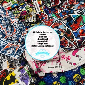 May include: A collection of fabric scrub caps featuring various comic book character prints including Spider-Man, Wonder Woman, and Batman. A central circular overlay displays the text: 63 Fabric Patterns, euro, tie back, bouffant, ponytail, high bun, Satin Lining optional, PittsburghPE.