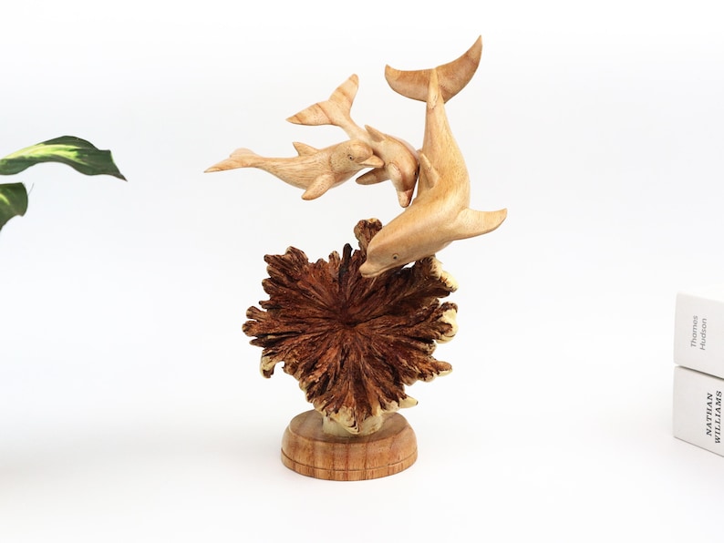 Hand carved wooden dolphin sculpture on driftwood base, coastal ocean decor marine life art