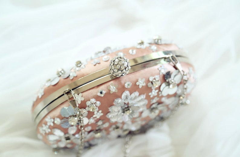Womens Jewellery and Accessories Wedding Clutch Bag Peach Oval Silk Clutch Bag with Silver Sequins and Crystals by Hyaline London