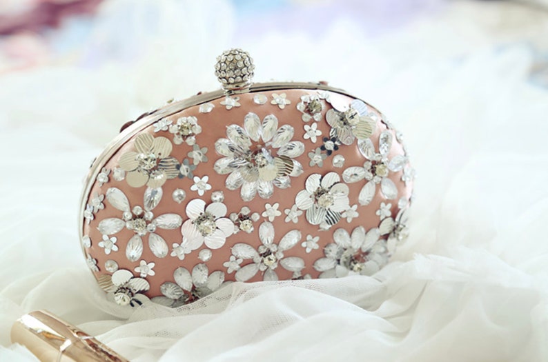 Womens Jewellery and Accessories Wedding Clutch Bag Peach Oval Silk Clutch Bag with Silver Sequins and Crystals by Hyaline London