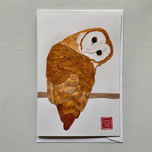 Carte de voeux aquarelle découpée à la main avec une chouette effraie des cloches