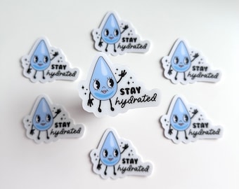 May include: Set of seven blue and white water drop stickers with the text "Stay hydrated" on each sticker.
