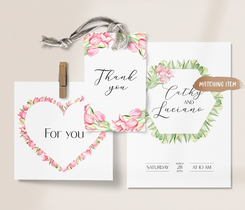 May include: A set of three printable wedding stationery designs featuring pink flowers and greenery. The designs include a thank you tag, a save the date card, and a small card that says "For you".
