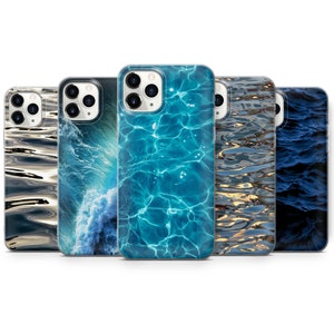 May include: Five different iPhone cases with various water-themed designs. The cases feature images of blue water, waves, and ripples.