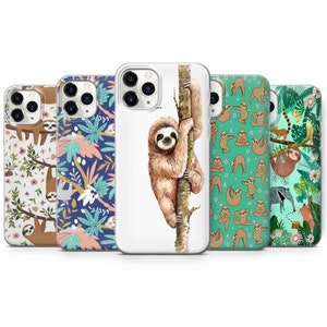 May include: Five different phone cases featuring sloths. The cases are all white with a clear back and have different designs. One case features a sloth hanging from a tree branch, another features a sloth doing yoga, and another features a sloth in a jungle scene.