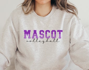 Puede incluir: Una sudadera gris con el texto "MASCOT volleyball" en letras moradas y negras.