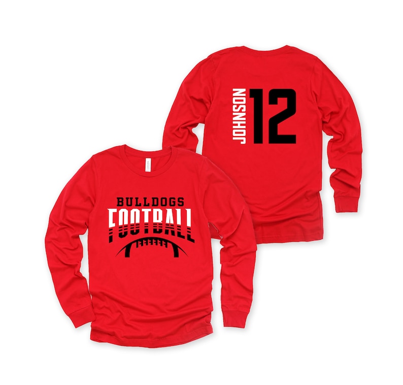 May include: Red long-sleeve t-shirt with a black and white football graphic and the text "Bulldogs Football". The back of the shirt has a black number "12" and the text "Johnson" in white.