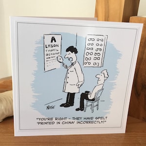 May include: A cartoon illustration of an eye doctor examining a patient's eyesight. The doctor is holding a magnifying glass and pointing to an eye chart. The patient is sitting in a chair and looking at the chart. The caption reads "You're right - they have spelt 'Printed in China' incorrectly!"