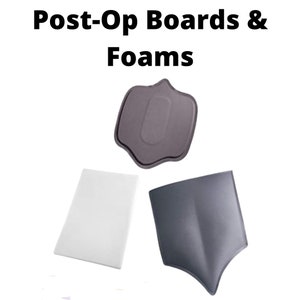 May include: Three post-operative boards and foams for medical use. The boards are gray and white, and the foams are gray.