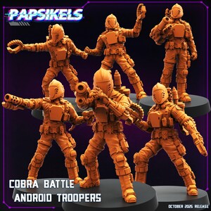 Puede incluir: Figuras de soldados androides de color naranja en varias poses de acción. Cada figura está equipada con armadura futurista, cascos y armas. El texto "COBRA BATTLE ANDROID TROOPERS" se muestra en la parte inferior. Las figuras están sobre bases negras.