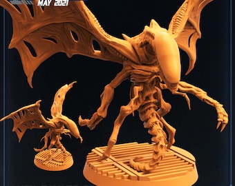 May include: A 3D printed miniature of an alien creature with wings, a long tail, and a large head. The creature is painted in a light brown color and is standing on a circular base. The base is decorated with a grid pattern. The miniature is labeled "Alien Savage Flyer".