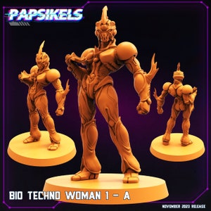 Può includere: Un set di tre miniature dipinte di arancione e bianco che rappresentano un robot umanoide. Le miniature sono in pose d'azione diverse. Le miniature sono su uno sfondo bianco. Il testo "BIO TECHNO WOMAN 1 - A" è stampato sotto le miniature.