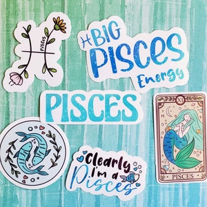 May include: A set of six stickers featuring the astrological sign Pisces. The stickers are in various styles, including a simple line drawing of the Pisces symbol, a stylised text design, and a cartoon illustration of two fish. The stickers are all in shades of blue and green.