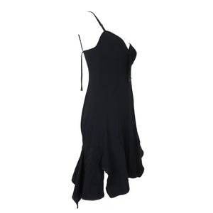 May include: A black sleeveless dress with a sweetheart neckline and a ruffled hem. The dress has a fitted bodice and a flowing skirt.