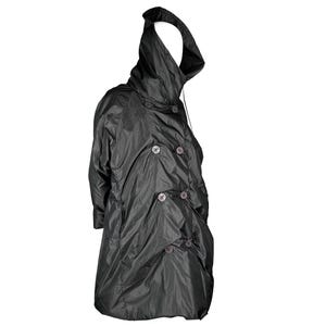 May include: A black, lightweight, double-breasted coat featuring a large, structured hood and a series of dark buttons down the front. The garment has a slightly crinkled texture and long sleeves, providing a loose, draped fit throughout the body.