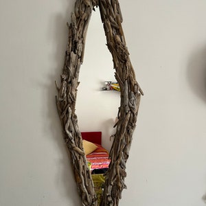 Ecological wall mirror with sea wood