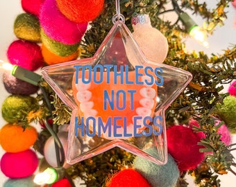 Desdentado, no sin hogar: adorno navideño