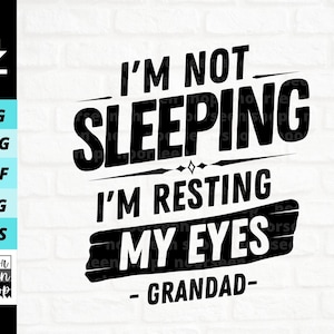 May include: Black and white text graphic design with the text "I'm not sleeping I'm resting my eyes - Grandad -"