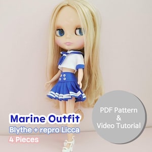 May include: A Blythe doll wearing a marine-themed outfit. The outfit includes a white and blue sailor top, a blue pleated skirt, and white platform shoes. The doll has long blonde hair and blue eyes. Text on the image reads "Marine Outfit Blythe + repro Licca 4 Pieces".