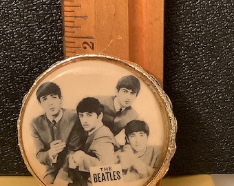 Broche de los Beatles de 1964