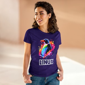 May include: A purple t-shirt with a colorful penguin graphic and the word "LINUX" printed on the front.