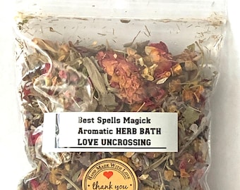 May include: A clear plastic bag filled with dried herbs and flowers. The bag has a label that reads "Best Spells Magick Aromatic Herb Bath Love Uncrossing". There is a small sticker on the bag that says "Hand Made With Love thank you Especially For You".