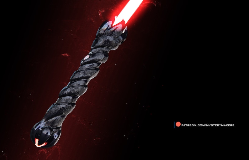 May include: A black lightsaber with a textured, twisted handle and a bright red blade. The handle has a detailed, organic design. The background is a gradient of red and black. The text "PATREON.COM/MYSTERYMAKERS" is in the bottom right corner.