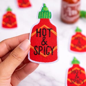 May include: A rustic wooden sign with the text "Welcome to our home" in white lettering. The sign features a distressed finish and a simple, inviting design, perfect for a front porch or entryway.