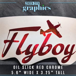 May include: Red chrome vinyl decal with the words "Flyboy" and a silhouette of a plane. The decal is 5.6 inches wide and 3.25 inches tall.