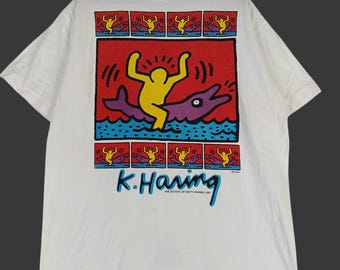 Camiseta vintage de Keith Haring de los años 90 con diseño de delfines y pop art, tamaño grande, obra de arte de Keith Haring, litografía colorida del artista estadounidense, camisetas negras, talla L