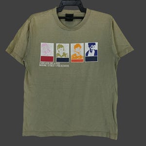 Camiseta vintage Y2K Manic Street Preachers verde com gola média desgastada, banda Manic Britpop Indie Band Music Japan Tour, tamanho M