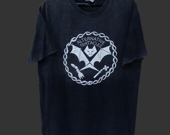 Camiseta negra grande vintage Y2K de Alternative Tentacles, Jello Biafra y Dead Kennedy Band. Sello discográfico Alternative Tentacles, punk rock. Talla L.