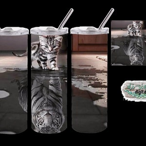 May include: Three stainless steel tumblers with a white cat and a tiger reflection in the bottom. The cat is looking at the viewer. The tumblers are on a gray tiled floor.