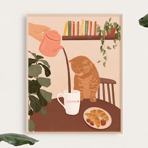 Pode incluir: Um gato ruivo sentado em uma cadeira olhando para uma caneca branca com a palavra "COFFEE" nela. Um bule rosa despeja café na caneca. Há croissants e morangos em um prato sobre uma mesa marrom.