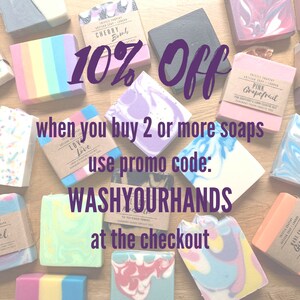May include: Assortment of colorful handmade soap bars with various scents, including cherry blossom, grapefruit, and love.  The text "10% Off when you buy 2 or more soaps use promo code: WASHYOURHANDS at the checkout" is displayed on the image.