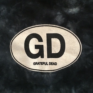 Símbolo de Grateful Dead GD en una camiseta negra sutil: camiseta de Grateful Dead con etiquetas Sundog de la vieja escuela (tallas mediana, grande, XL y 2XL)