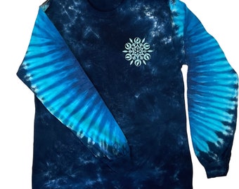 May include: A long-sleeved tie-dye shirt in shades of blue with a white mandala design on the front. The shirt has a relaxed fit and a crew neck.