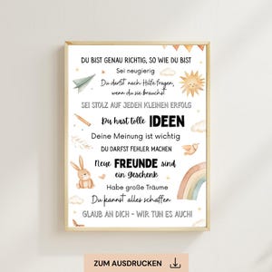 Könnte beinhalten: Ein gerahmter Druck mit inspirierendem Text auf Deutsch, mit Illustrationen von Sonne, Regenbogen und Hase. Der Text fördert Selbstvertrauen und Positivität. Der Rahmen ist hellholzfarben.