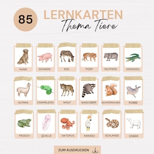 May include: A set of 18 animal flashcards with watercolor illustrations, including a dog, pig, donkey, tiger, and more. The cards are labeled in German with the title "Thema Tiere" and the number "85".