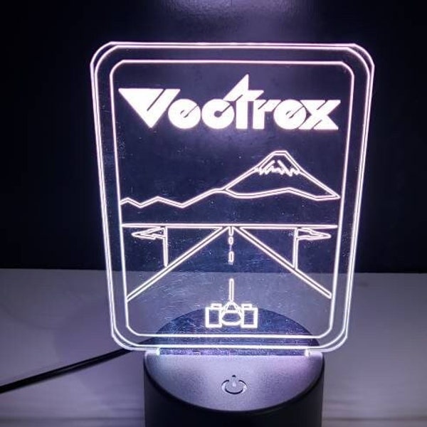 Vectrex pole position led lamp ( show it off ) will display 8 different colors and has a remote control.