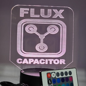 Flux capacitor BTTF led puck lamp will display 8 different colors and has a remote control ( show it off )