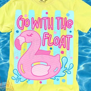 May include: Yellow t-shirt with a pink flamingo float graphic and the text "Go With The Float". The design includes blue vertical stripes and water splashes, with the words "original designer" at the bottom.