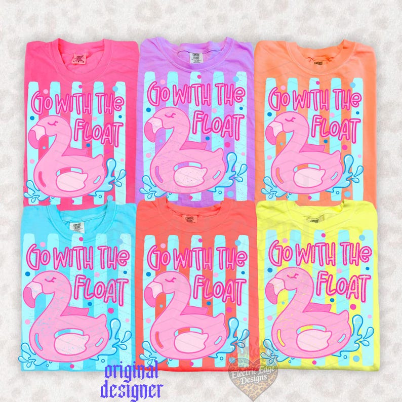 May include: Six colorful t-shirts with a flamingo float design. Each shirt features the text "Go With The Float" and a pink flamingo float graphic. The shirts are in shades of pink, purple, orange, blue, red, and yellow.