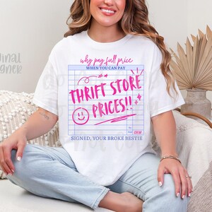 May include: White t-shirt with a pink graphic that reads "Why pay full price when you can pay Thrift Store Prices!!" in a ledger-style design. The shirt also includes a smiley face and the text "Signed, your broke bestie."