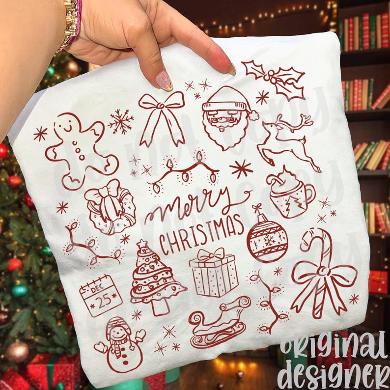 May include: White Christmas-themed pillowcase with red line art illustrations. Designs include a gingerbread man, Santa Claus, reindeer, Christmas tree, ornaments, and the words "Merry Christmas". The pillowcase is held by a person.