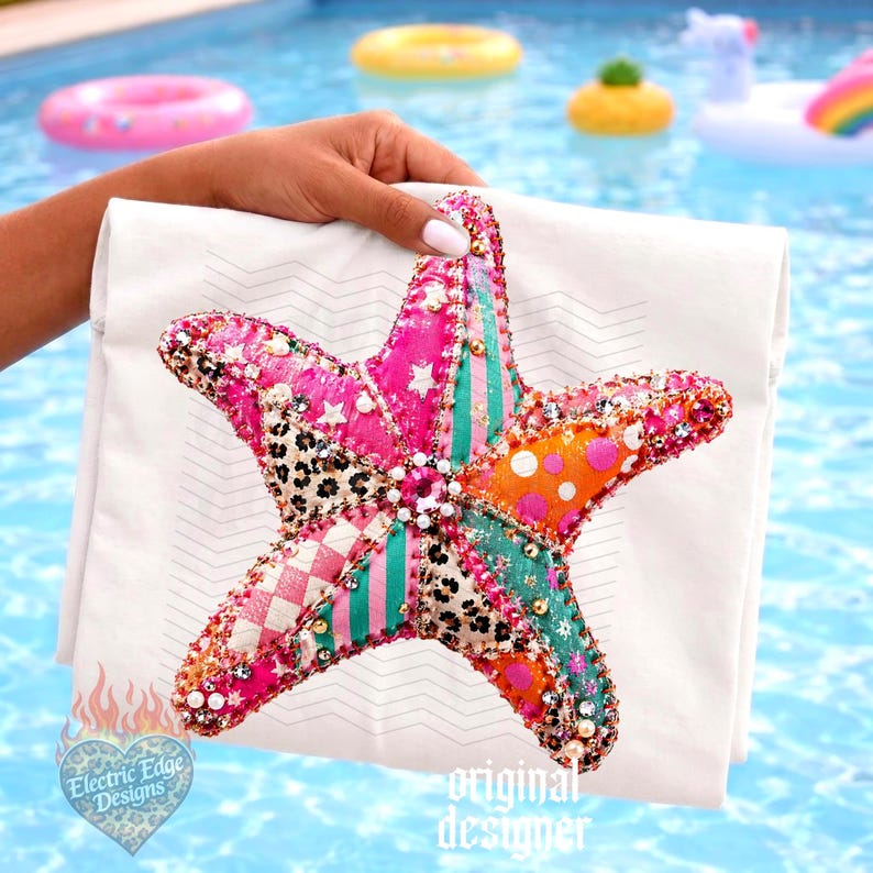 May include: A white tote bag featuring a colorful, embellished starfish design. The starfish is a patchwork of pink, orange, teal, and leopard print fabrics, adorned with sequins and beads. The bag has the text "Electric Edge Designs" and "original designer".