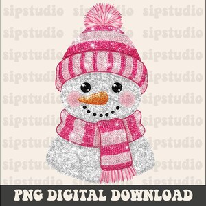 May include: A digital illustration of a snowman wearing a pink knitted hat and scarf, with rosy cheeks. The snowman has a carrot nose, black eyes, and a coal mouth. The image includes the text "PNG DIGITAL DOWNLOAD".